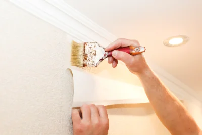 Pose de papier peint à Maulette — revêtements muraux et toiles de verre